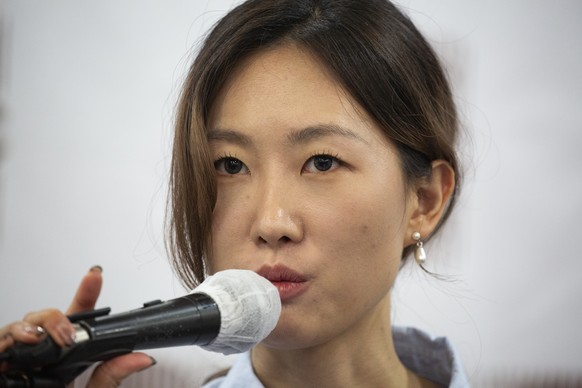 epa10939899 Survivor Lee Ju-Hyun speaks during a foreign press conference on the upcoming first anniversary of the Itaewon disaster, in Seoul, South Korea, 26 October 2023. A total of 159 people died  ...