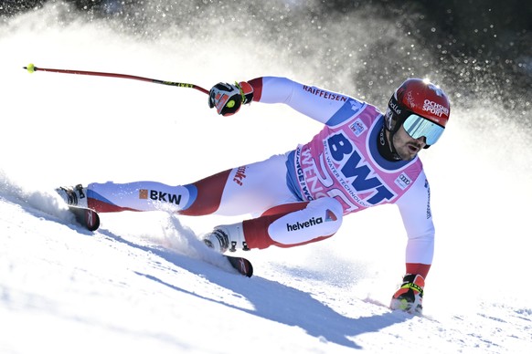 Loic Meillard of Switzerland in action during the men&#039;s super-g race at the Alpine Skiing FIS Ski World Cup in Wengen, Switzerland, Thursday, January 13, 2022. (KEYSTONE/Jean-Christophe Bott)