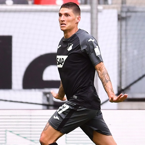 epa08469274 Steven Zuber (L) of Hoffenheim celebrates with teammate Christoph Baumgartner after scoring the 2-1 lead during the German Bundesliga soccer match between Fortuna Duesseldorf and 1899 Hoff ...