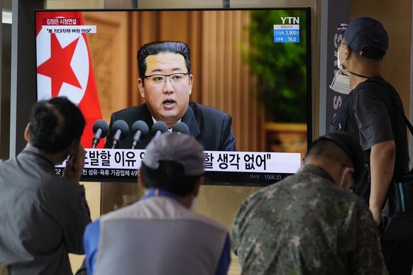 People watch a TV screen showing North Korean leader Kim Jong Un in a news program, at Seoul Railway Station in Seoul, South Korea, Thursday, Sept. 30, 2021. Kim expressed his willingness to restore s ...