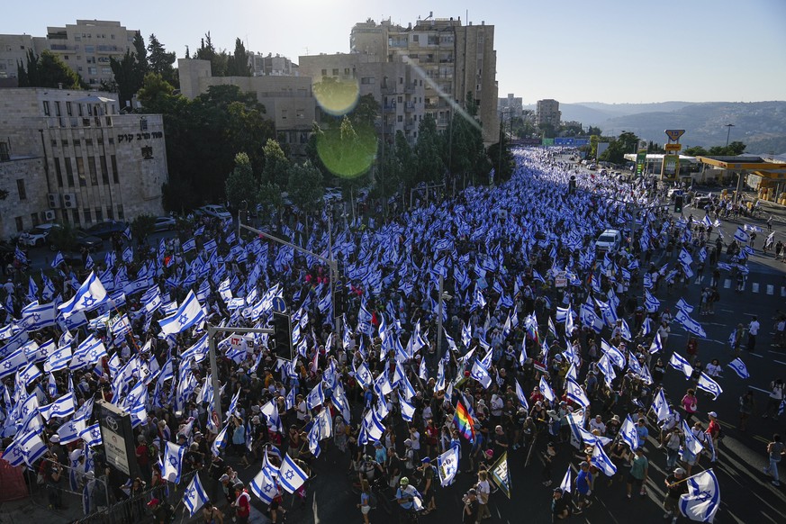 Thousands of Israelis march on Jerusalem in protest against plans by Prime Minister Benjamin Netanyahu's government to overhaul the judicial system, in Jerusalem, Saturday, July 22, 2023. Thousands…