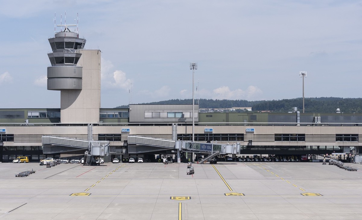 A few aircraft wait at the boarding gates on an almost empty tarmac on Friday 19 July 2024 at Zurich airport in Kloten, Switzerland. Due to a worldwide IT breakdown, check-in for air travellers and fl ...