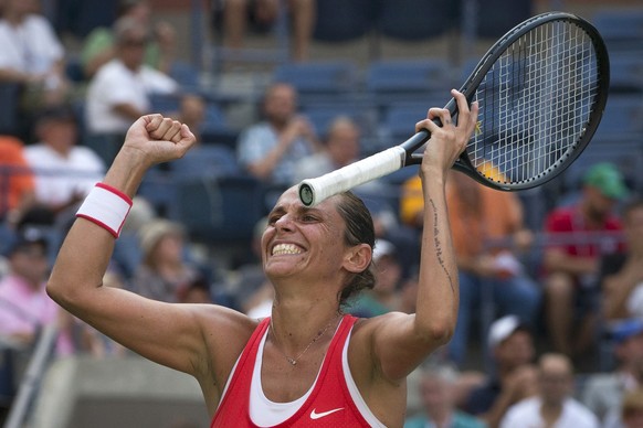 Roberta Vinci of Italy celebrates after defeating Kristina Mladenovic of France in their quarterfinals match at the U.S. Open Championships tennis tournament in New York, September 8, 2015. REUTERS/Ad ...