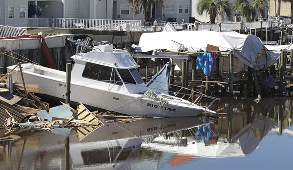 Boats are seen among the rubble in Mexico Beach, Fla., on Friday, Oct. 12, 2018, two days after a Category 4 Hurricane Michael devastated the small coastal town just outside Panama City, Fla. (Pedro P ...