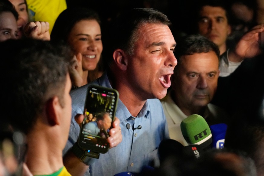 Opposition presidential candidate Sen. Flavio Bolsonaro speaks after advancing to a runoff election following the first round of the presidential election in Brasilia, Brazil, Sunday, Oct. 4, 2026. (A ...