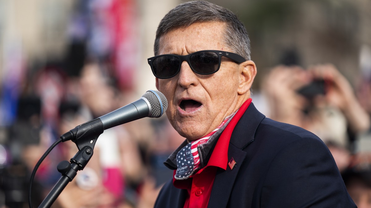 epa08879709 Former National Security Advisor and convicted felon Michael Flynn speaks to supporters of US President Donald J. Trump who gathered outside the Supreme Court to echo Trump's baseless ...