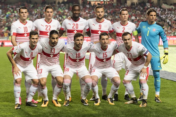 The Swiss team with top from left, Granit Xhaka, Fabian Schaer, Johan Djourou, Stephan Lichtsteiner and goalkeeper Yann Sommer, and bottom from left, Remo Freuler, Ricardo Rodriguez, Admir Mehmedi, Bl ...