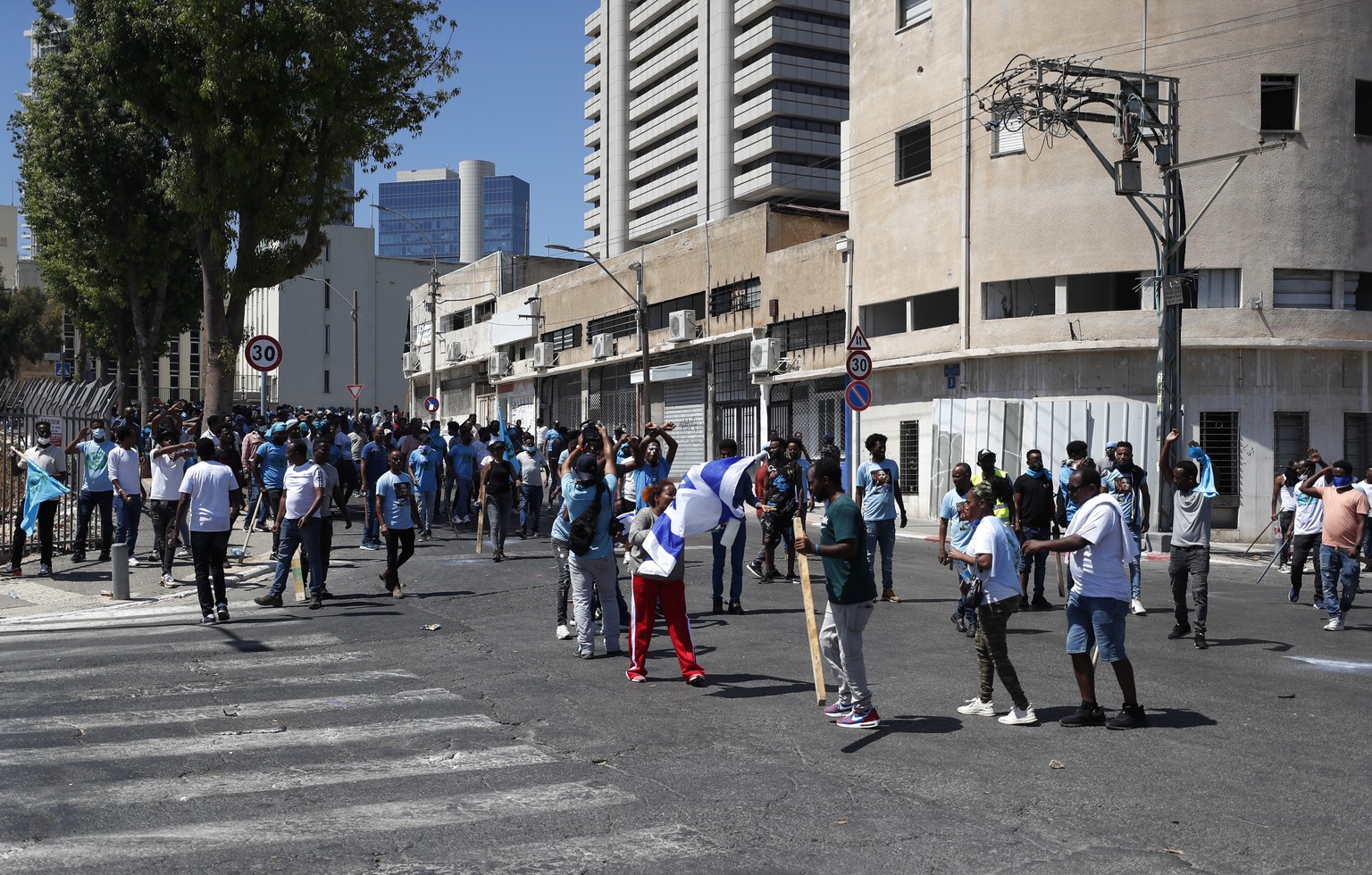 epa10835489 Opponents of the Eritrean regime take part in a protest against a pro-regime conference, in Tel Aviv, Israel, 02 September 2023. The protest was againt a pro-Eritrean regime conference due ...