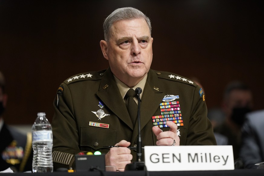 epa09493035 Chairman of the Joint Chiefs of Staff Gen. Mark Milley attends during a Senate Armed Services Committee hearing on the conclusion of military operations in Afghanistan and plans for future ...