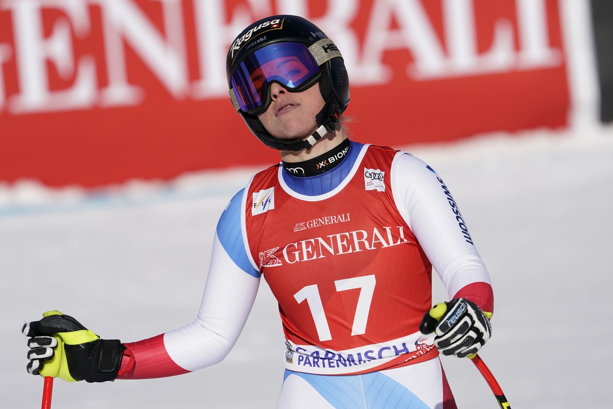 Switzerland's Lara Gut-Behrami reacts in the finish area of an alpine ski, women's World Cup super G, in Garmish Partenkirchen, Germany, Sunday, Feb. 9, 2020. (AP Photo/Giovanni Auletta)