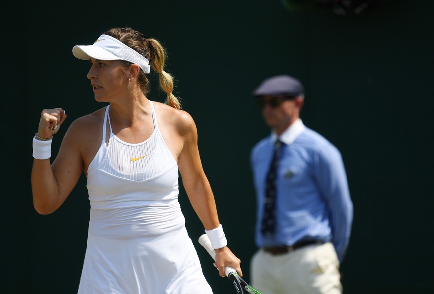 epa06871125 Belinda Bencic of Switzerland reacts during her third round match against Carla Suarez Navarro of Spain at the Wimbledon Championships at the All England Lawn Tennis Club, in London, Brita ...