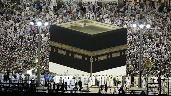 epa06170907 Muslim worshippers pray around the holy Kaaba at the Grand Mosque in Mecca, Saudi Arabia, 29 August 2017. Around 2.6 million Muslims are expected to attend this year&#039;s Hajj pilgrimage ...