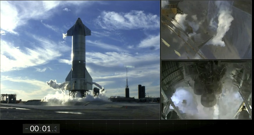 This frame grab from video posted on the SpaceX Twitter page shows views of SpaceX&#039;s futuristic Starship just after an automatic engine abort occurred with just 1.3 seconds remaining in the count ...