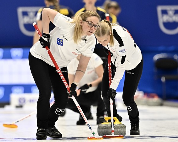 epa10531980 Switzerland&#039;s Alina Paetz (L) and Briar Schwaller-Huerlimann in action during the match between Sweden and Switzerland of the round robin session 3 of the World Women&#039;s Curling C ...