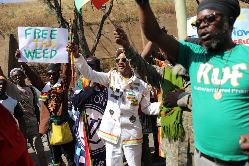 epa07029334 Supporters of the legislation of marijuana celebrate after the Constitutional Court ruled that the personal use and growing of marijuana in South Africa is legal, Johannesburg, South Afric ...