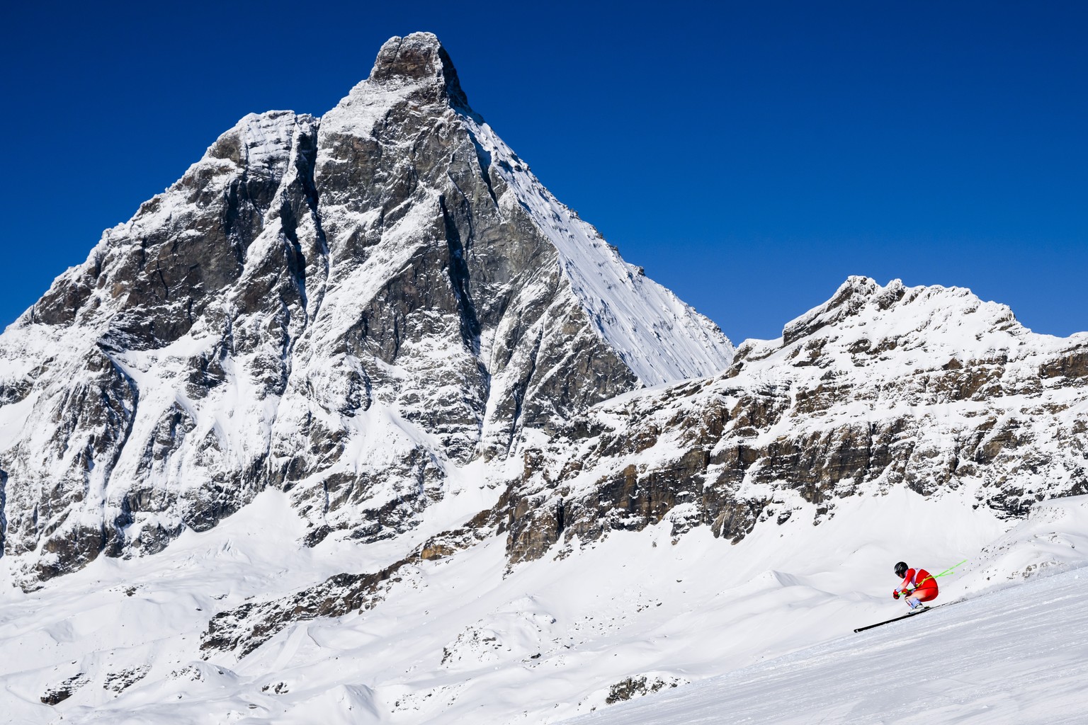 Ralph Weber of Switzerland in action front of the Matterhorn/Cervino mountain during the men&#039;s downhill training race on the new ski course &quot;Gran Becca&quot; at the Alpine Skiing FIS Ski Wor ...