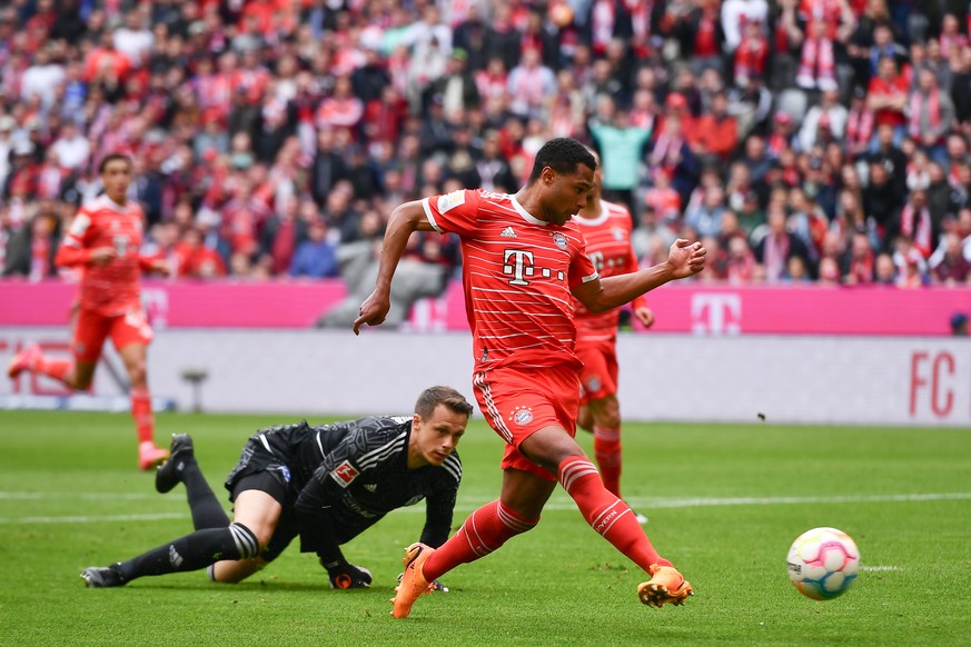 epa10625139 Serge Gnabry of FC Bayern Munich scores the 4-0 lead during the German Bundesliga soccer match between FC Bayern Munich and FC Schalke 04 in Munich, Germany, 13 May 2023. EPA/ANNA SZILAGYI ...