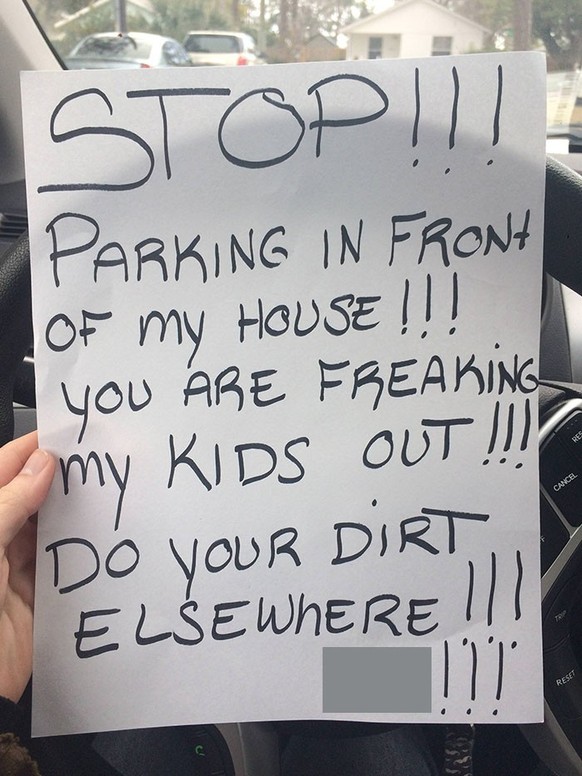 Ugly neighbor puts letter on car