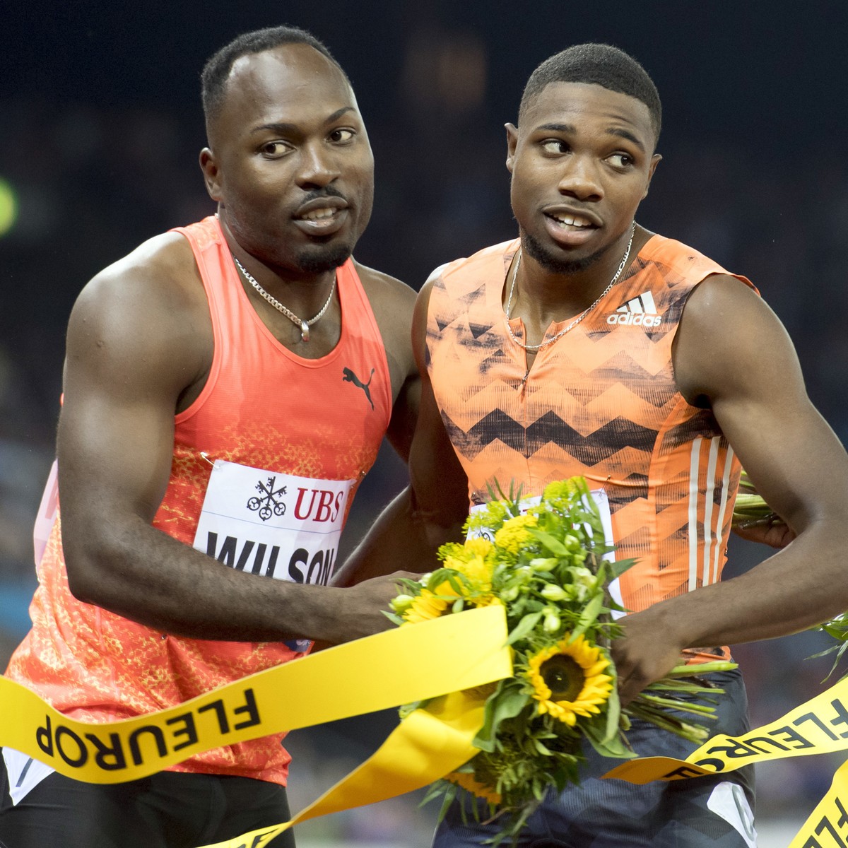 United States' Noah Lyles, right, is congratulated by Switzerland's Alex Wilson after winning the men's 200m race during the Weltklasse IAAF Diamond League international athletics meeti ...