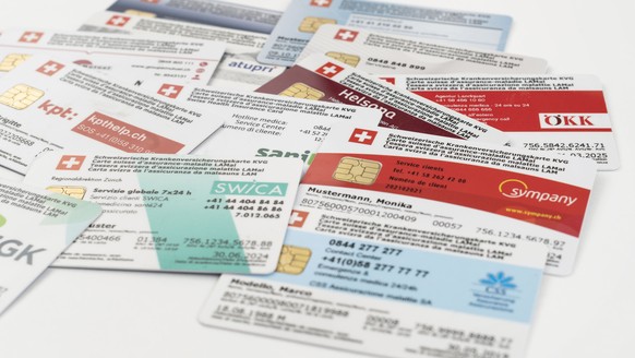 THEMENBILD ZU DEN KRANKENKASSENPRAEMIEN --- [Symbolic Image] Different Swiss health insurance cards, photographed in Zurich, Switzerland, on September 9, 2019. (KEYSTONE/Christian Beutler)..[Symbolbil ...
