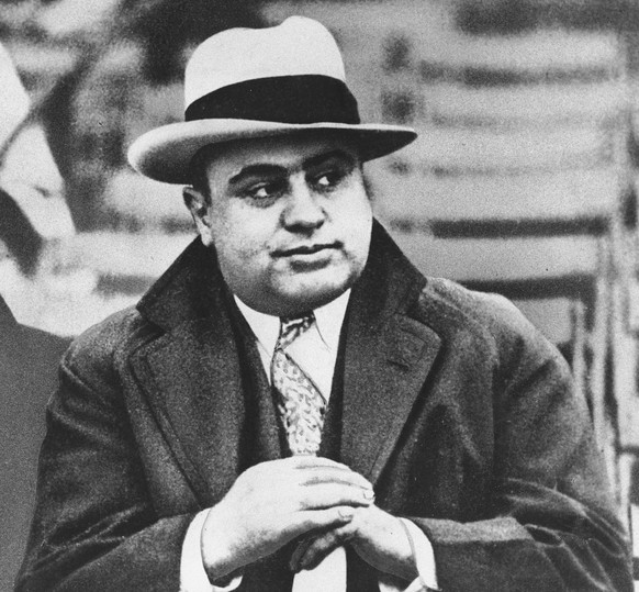 FILE - In this Jan. 19, 1931 file photo, Chicago mobster Al Capone attends a football game in Chicago. On Thursday, Feb. 14, 2013, the Chicago Crime Commission and the Drug Enforcement Administration  ...