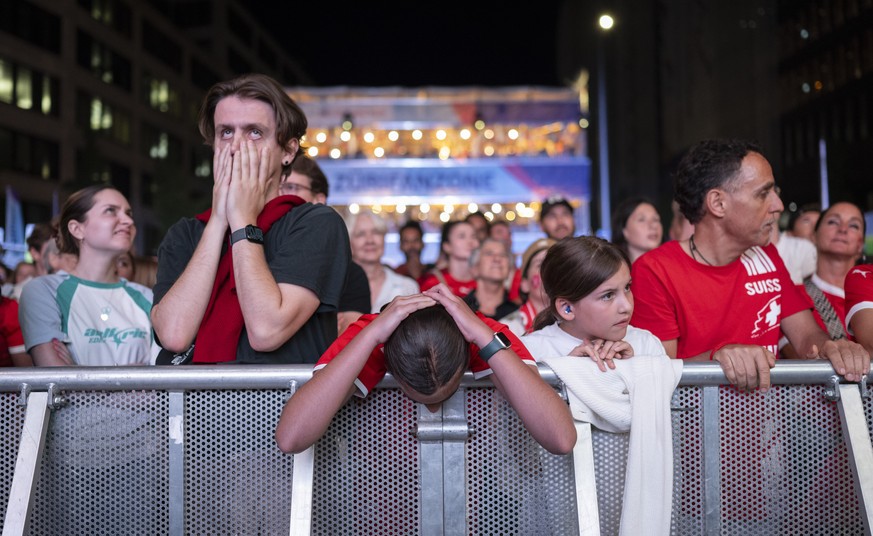 Swiss soccer fans reacts during the live broadcast of the UEFA Women&#039;s EURO 2025 soccer match between Finland and Switzerland at the ZueriFanzone Europaallee in Zurich, Switzerland, Thursday, 10. ...