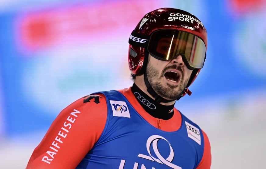 epa11099545 Loic Meillard of Switzerland reacts in the finish area after the second run of the Men's Giant Slalom Night race of the FIS Alpine Skiing World Cup in Schladming, Austria, 23 January ...