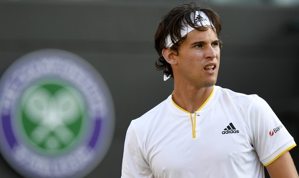 epa06066271 Dominic Thiem of Austria in action against Vasek Pospisil of Canada during their first round match for the Wimbledon Championships at the All England Lawn Tennis Club, in London, Britain,  ...