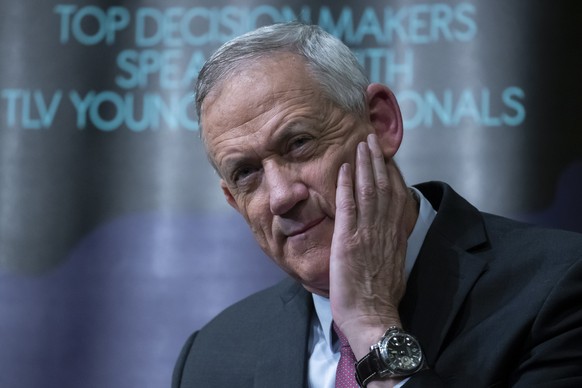 epa07480989 Benny Gantz, former Israeli Army Chief of Staff and chairman of the Blue and White Israeli centrist political party reacts as he speaks to a packed-house in an election campaign event in T ...