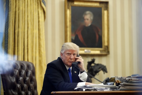 FILE - In this Jan. 28, 2017 file photo, President Donald Trump speaks on the phone with Prime Minister of Australia Malcolm Turnbull in the Oval Office of the White House in Washington. (AP Photo/Ale ...