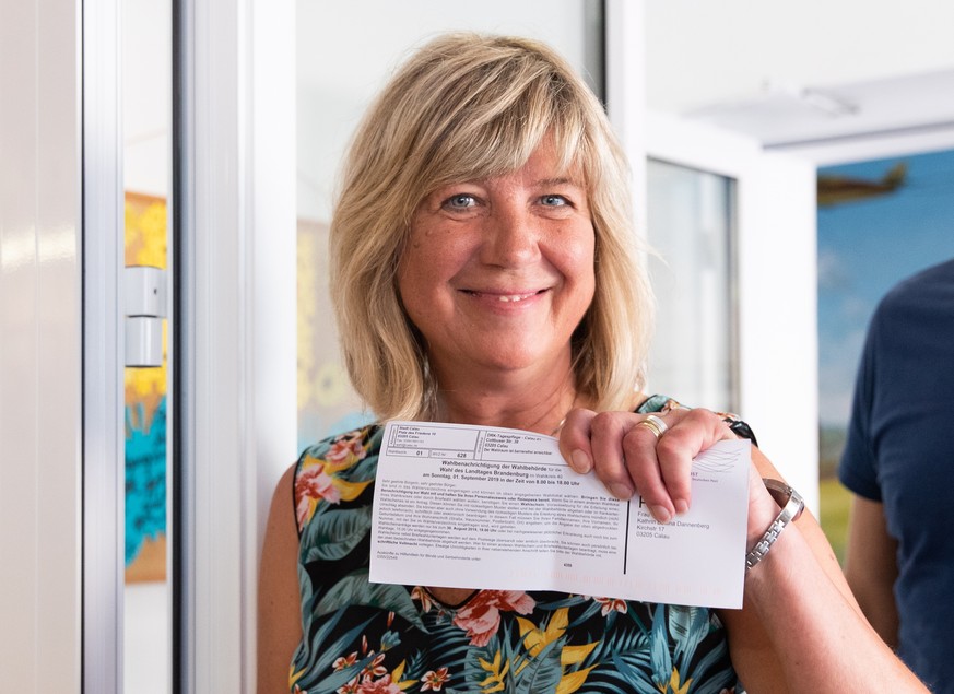 epa07809278 Brandenburg top co-candidate of The Left party Kathrin Dannenberg arrives to cast her ballot during the Brandenburg state elections at a polling station in Calau, Germany, 01 September 201 ...