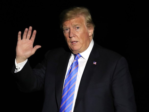 President Donald Trump waves upon arrival at the White House in Washington from a trip to Louisiana, Tuesday, May 14, 2019. (AP Photo/Manuel Balce Ceneta)