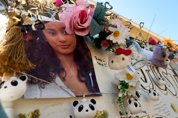 A makeshift Memorial for Celeste Rivas Hernandez, who was killed and found inside a vehicle owned by singer D4vd, is placed outside her home in Lake Elsinore, Calif., on Tuesday, April 21, 2026. (AP P ...