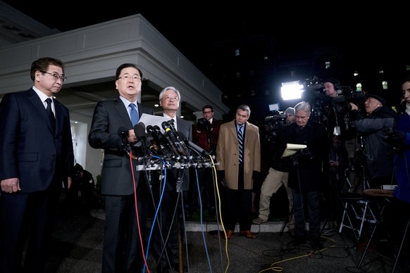 South Korean national security director Chung Eui-yong, center, speaks to reporters at the White House in Washington, Thursday, March 8, 2018, as intelligence chief Suh Hoon, left and Cho Yoon-je, the ...