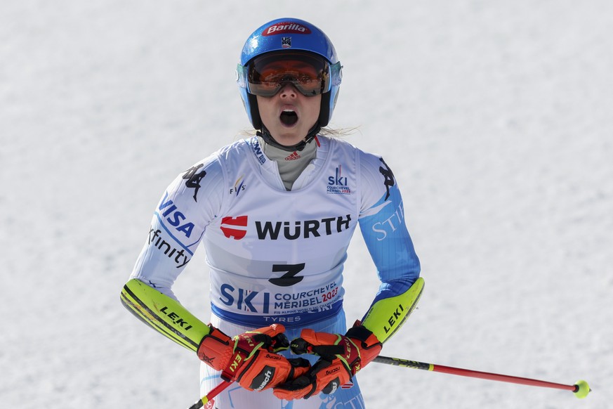 United States&#039; Mikaela Shiffrin celebrates after taking gold in an alpine ski World Championships giant slalom, in Meribel, France, Thursday, Feb. 16, 2023. (AP Photo/Alessandro Trovati)