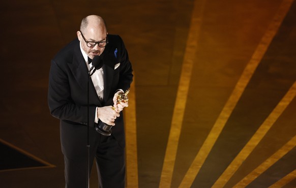 epa10518751 Edward Berger speaks after winning the Oscar for Best International Feature Film for 'All Quiet on the Western Front' at the 95th Annual Academy Awards Ceremony at the Dolby Theater in…