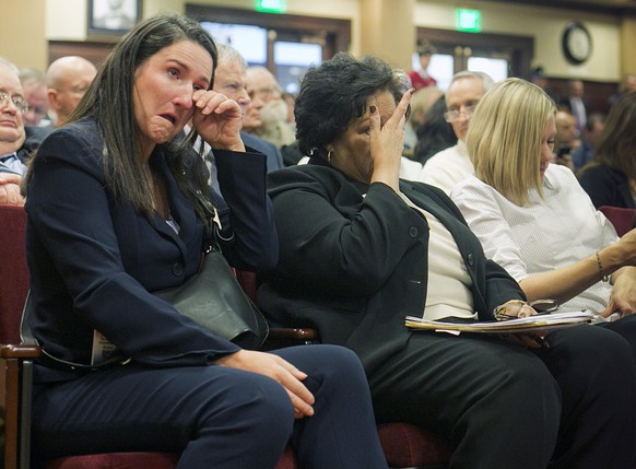 Sen. Cheri Buckner-Webb, D-Boise, center, and Rep. Ilana Rubel, D-Boise, left, are moved by the testimony of Bill Roden, former state lawmaker who was among the original co-sponsors of Idaho&#039;s fi ...