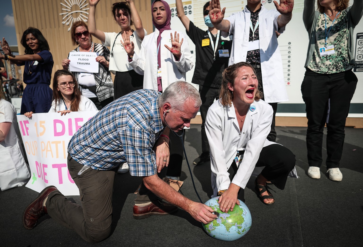 epa10308036 Members of The Global Climate &amp; Health Alliance take part in a protest during the 2022 United Nations Climate Change Conference (COP27), in Sharm El-Sheikh, Egypt, 16 November 2022. Th ...