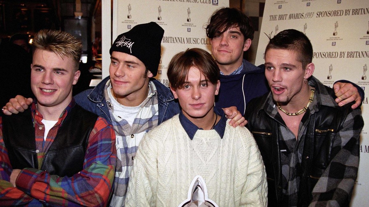 FILE - This is a Jan.11, 1993 file photo of British pop group Take That from left Gary Barlow, Howard Donald, Mark Owen, Robbie Williams and Jason Orange. On Thursday July 15, 2010 it was reported tha ...