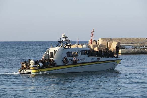 Lampedusa, Province of Agrigento, Italy, Circa September 2023, 7000 migrants people arrived on Italian island in 48 hours. Many of the latest people landed in coast have fled from Tunisia. In previous ...