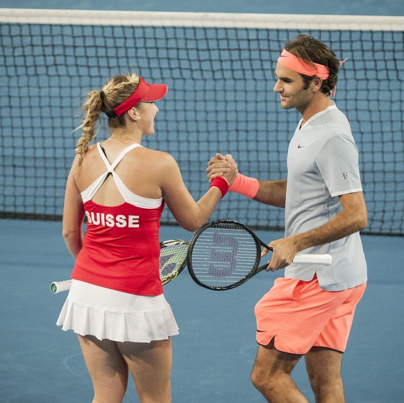 epa05695453 Belinda Bencic and Roger Federer of Switzerland during the mixed doubles match between Great Britain and Switzerland in session 4 of the Hopman Cup at the Arena in Perth, Australia, 02 Jan ...