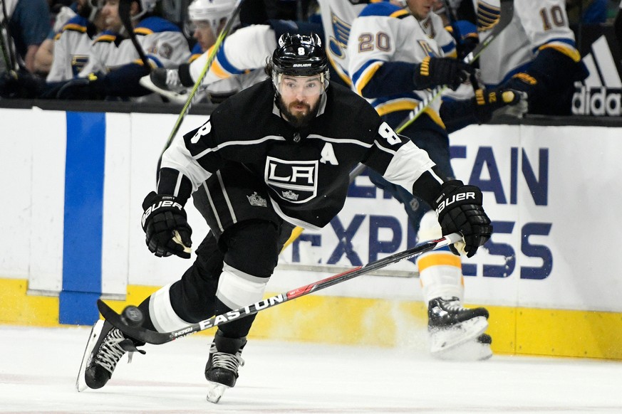 FILE - In this March 10, 2018, file photo, Los Angeles Kings defenseman Drew Doughty (8) brings the puck up the ice against St. Louis Blues during an NHL hockey game in Los Angeles. Through the first  ...