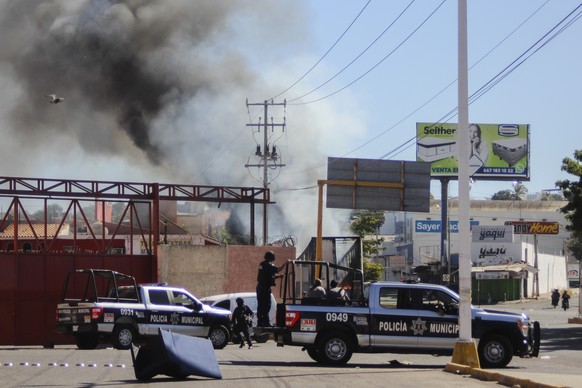 The policies arrives on the scene after a store was looted in Culiacan, Sinaloa state, Thursday, Jan. 5, 2023. Mexican security forces captured Ovidio Guzm�n, an alleged drug trafficker wanted by the  ...