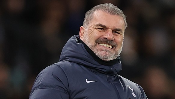epa11077153 Tottenham Hotspur manager Ange Postecoglou gestures and grimaces during the English Premier League soccer match between Manchester United and Tottenham Hotspur in Manchester, Britain, 14 J ...