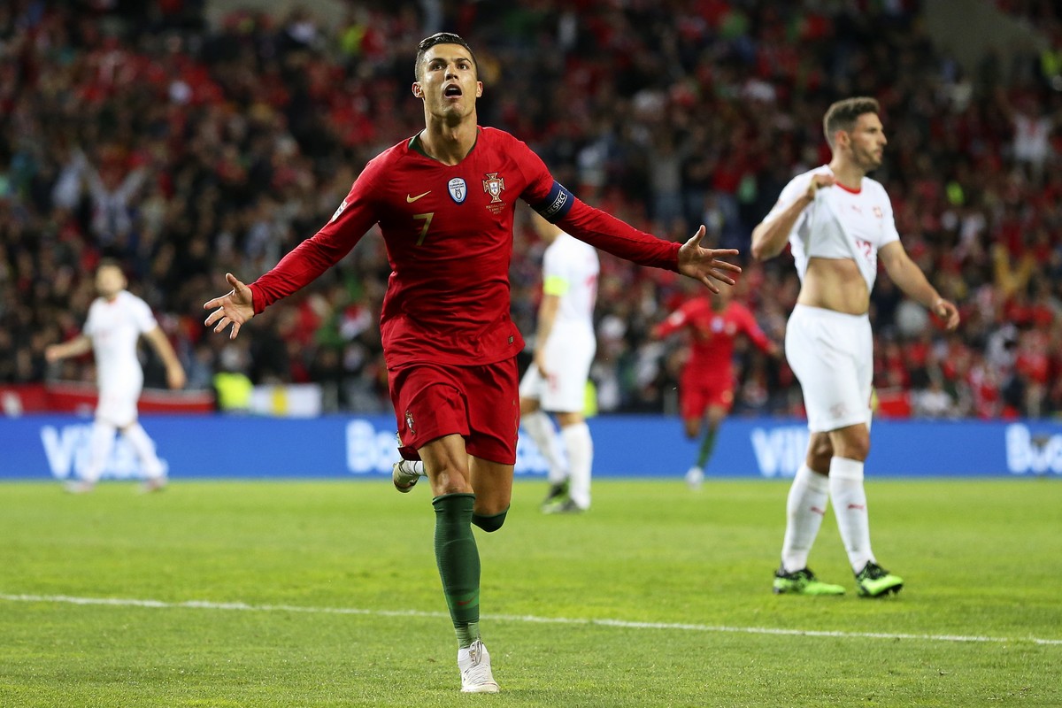 epa07628542 Portugal's Cristiano Ronaldo celebrates after scoring a goal during the UEFA Nations League semi final soccer match between Portugal and Switzerland at Dragao stadium in Porto, Portug ...