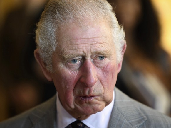 Britain&#039;s Prince Charles attends a reception during a visit to Homerton College at the University of Cambridge, to discuss access to education and learn of the college&#039;s vision to welcome an ...