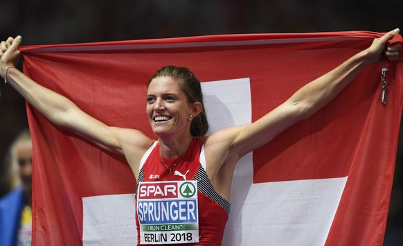 epa06941537 Lea Sprunger of Switzerland celebrates after winning the women&#039;s 400m Hurdles final at the Athletics 2018 European Championships, Berlin, Germany, 10 August 2018. EPA/FILIP SINGER