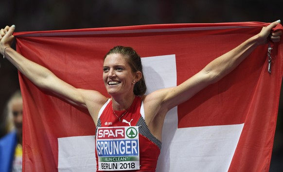 epa06941537 Lea Sprunger of Switzerland celebrates after winning the women&#039;s 400m Hurdles final at the Athletics 2018 European Championships, Berlin, Germany, 10 August 2018. EPA/FILIP SINGER