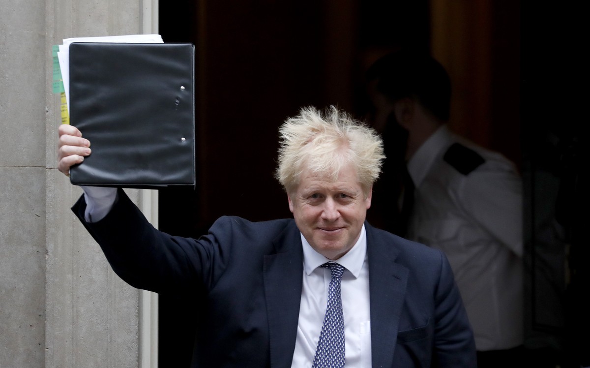 Britain's Prime Minister Boris Johnson leaves 10 Downing Street to attend the weekly Prime Ministers' Questions session, in parliament in London, Wednesday, Oct. 23, 2019. (AP Photo/Frank Au ...