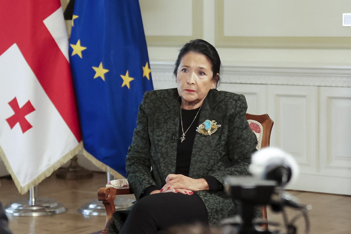 In this photo released by Administration of the President of Georgia, Georgian President Salome Zourabichvili speaks during her interview with the Associated Press after the parliamentary election in  ...